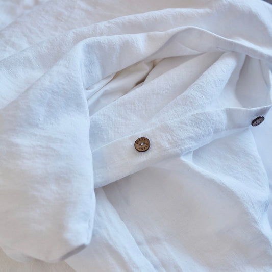 PIECERA CON MINI PLUMON DE SEDA BLANCO