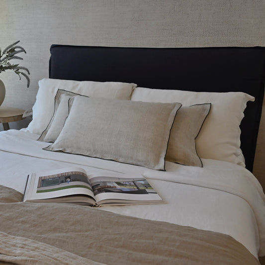 COJÍN VALKIRIA CON BORDE TAUPE